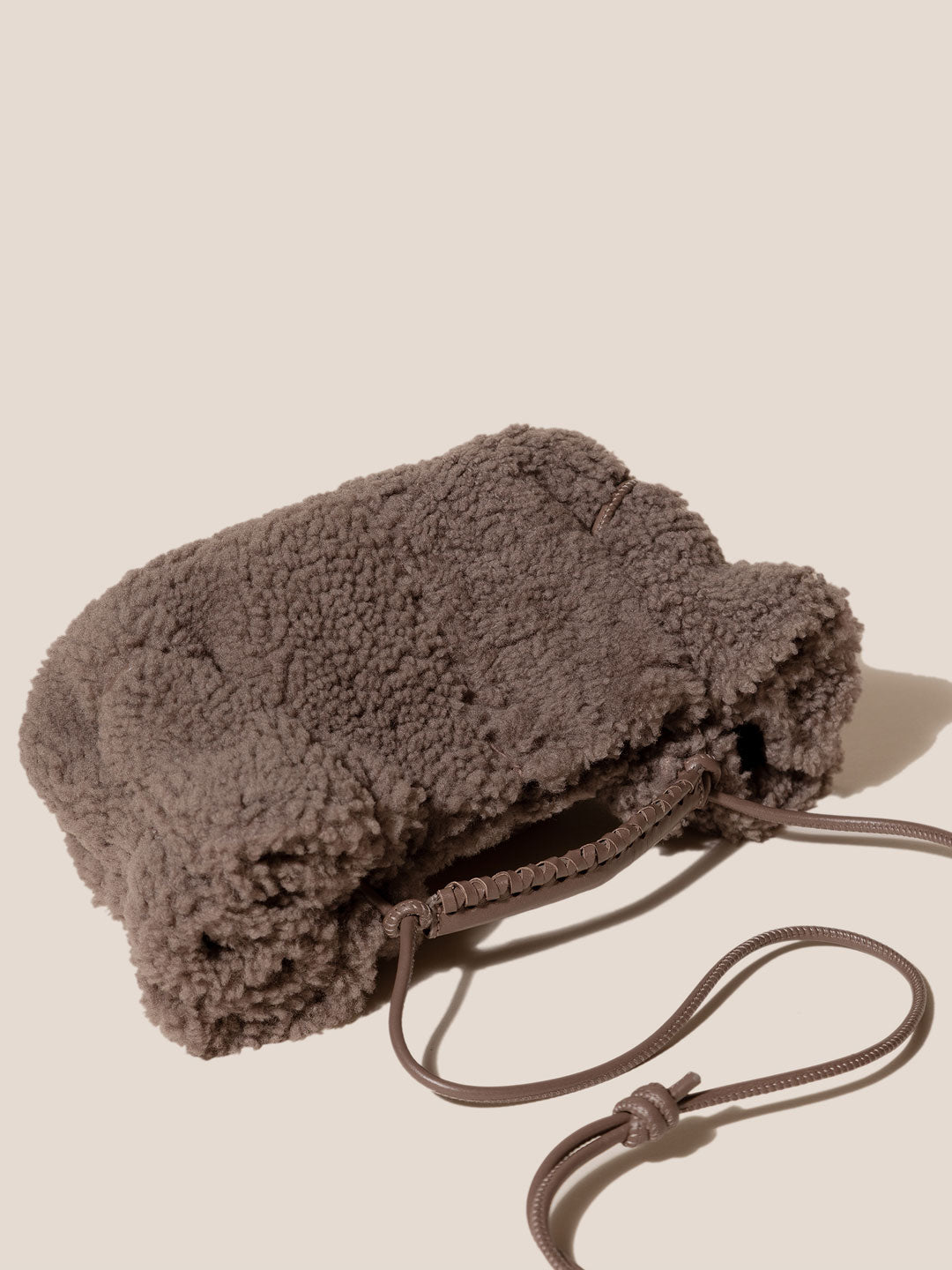 ARTA MINI CURLY SHEARLING - Pleated Crossbody Bag