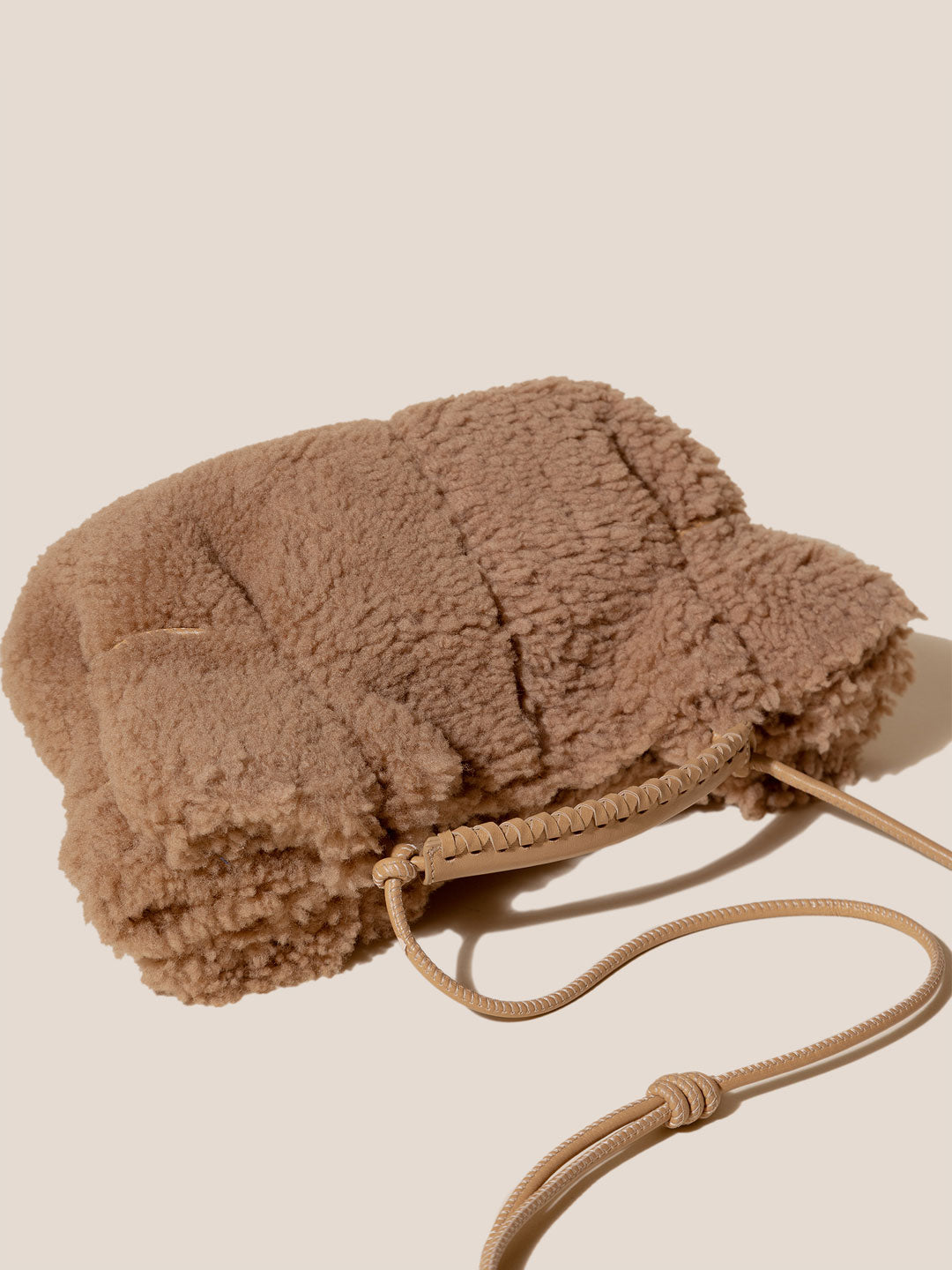 ARTA MINI CURLY SHEARLING - Pleated Crossbody Bag