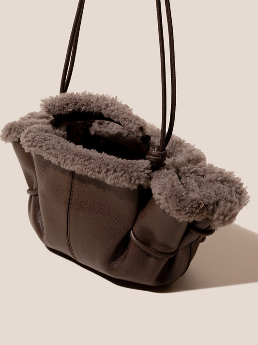 ARTA MINI CURLY SHEARLING TRIMS - Pleated Crossbody Bag