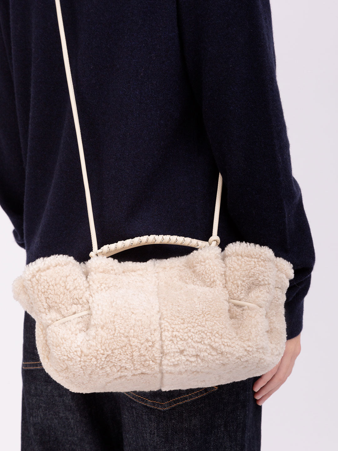 ARTA MINI CURLY SHEARLING - Pleated Crossbody Bag
