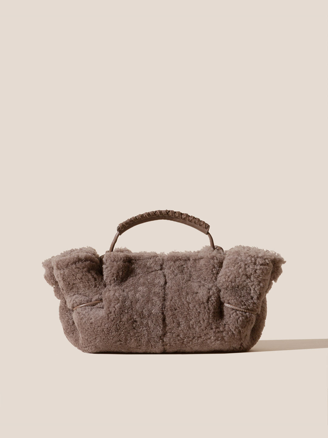 ARTA MINI CURLY SHEARLING - Pleated Crossbody Bag