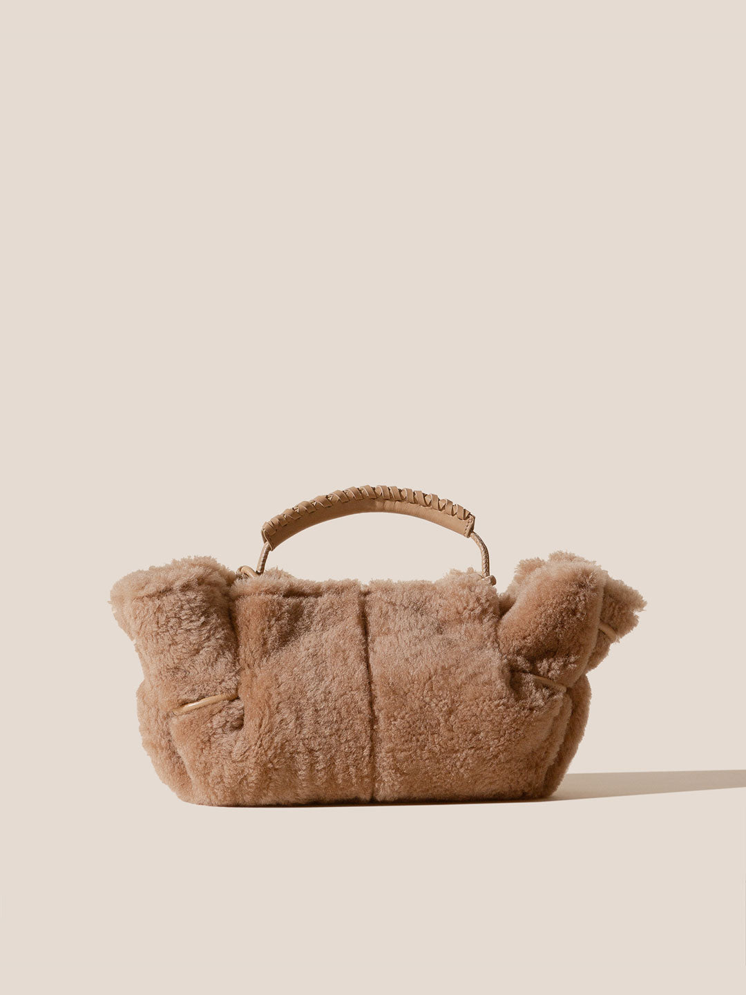 ARTA MINI CURLY SHEARLING - Pleated Crossbody Bag