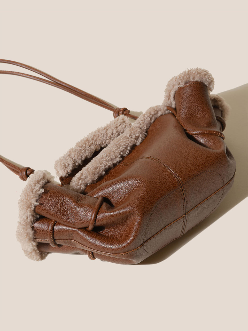 ARTA MINI CURLY SHEARLING TRIMS - Pleated Crossbody Bag