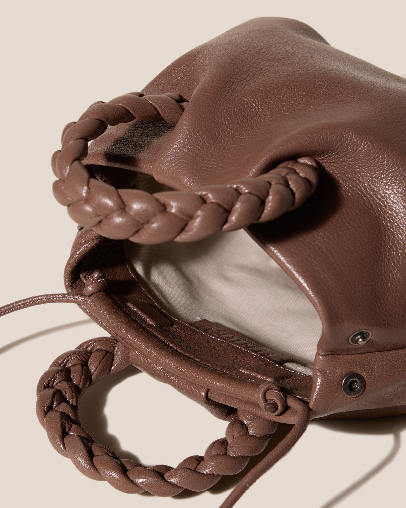 BOMBON M SUPPLE SHINY - Plaited-handle Leather Crossbody Bag