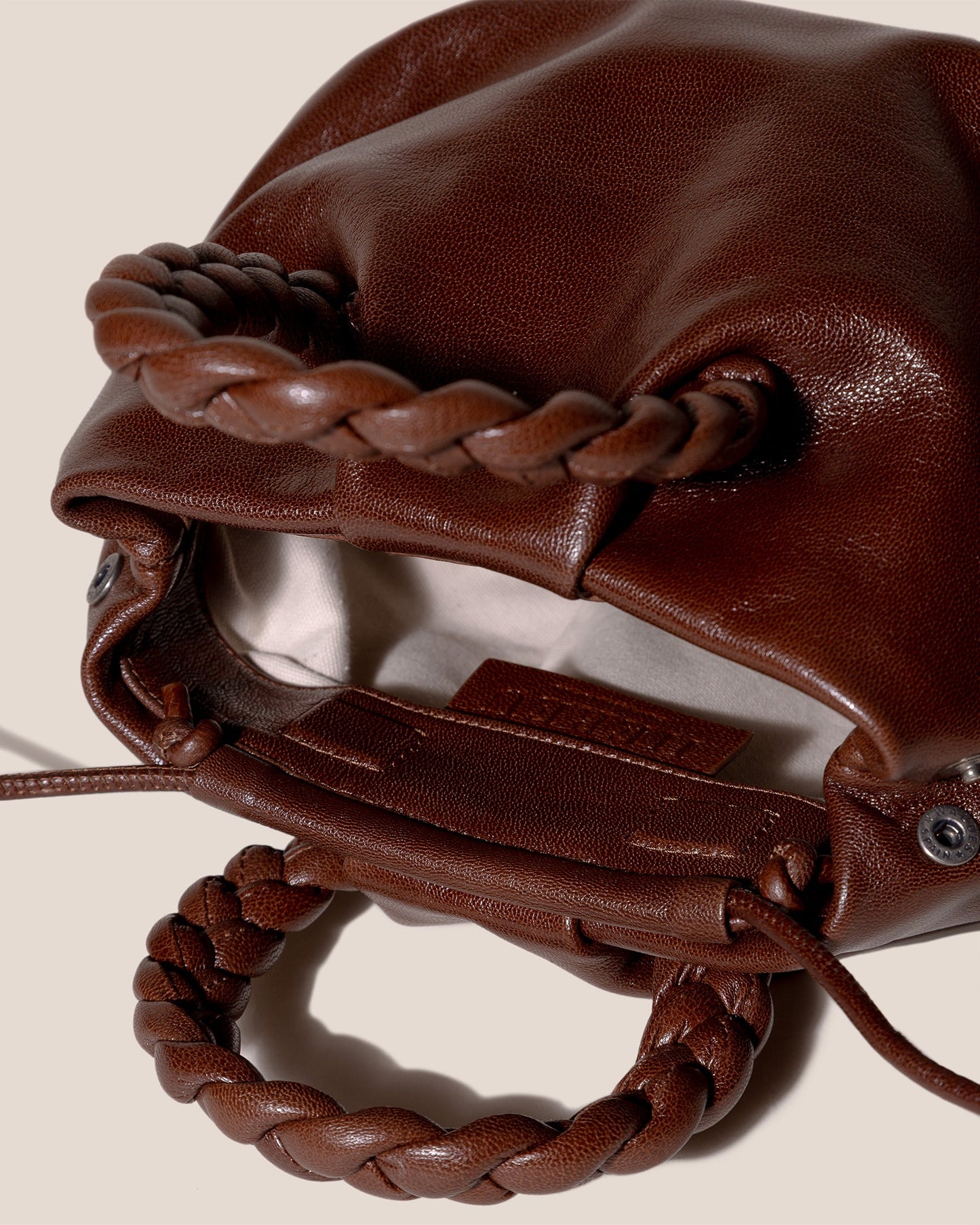 BOMBON M SUPPLE SHINY - Plaited-handle Leather Crossbody Bag